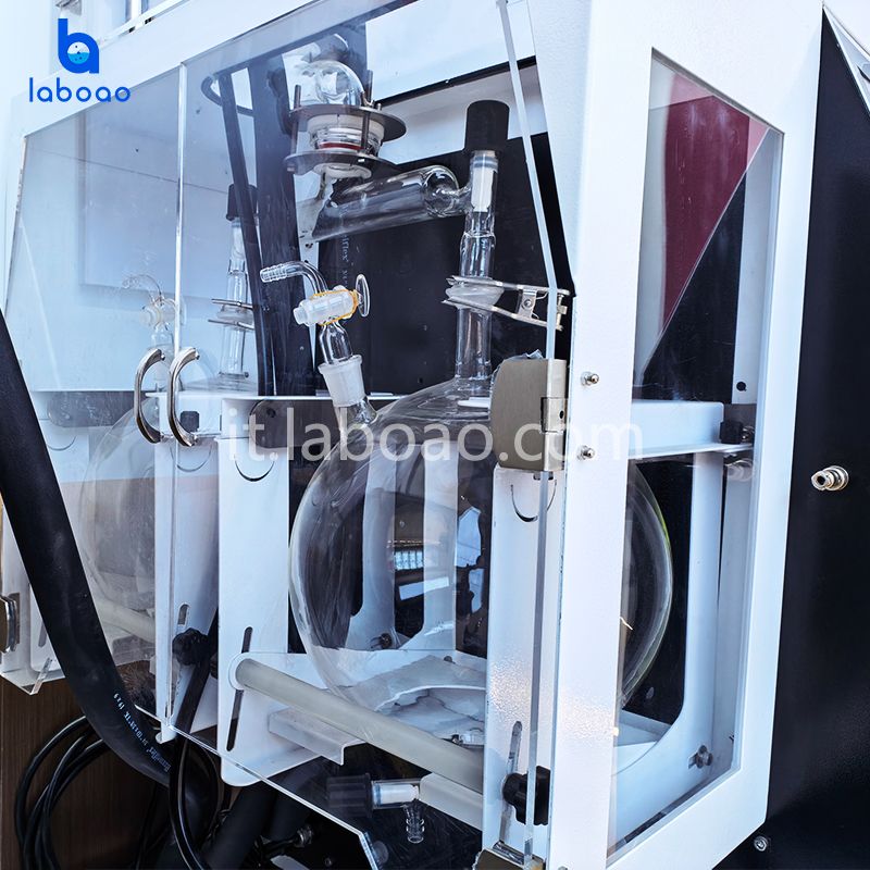 Evaporatore rotante con dispositivo di protezione e riempimento e scarico automatico